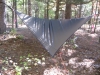 hammock out of skins and pulled down tight with bungees
